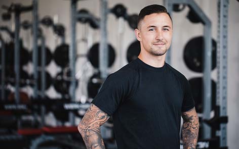 Man standing in a gym