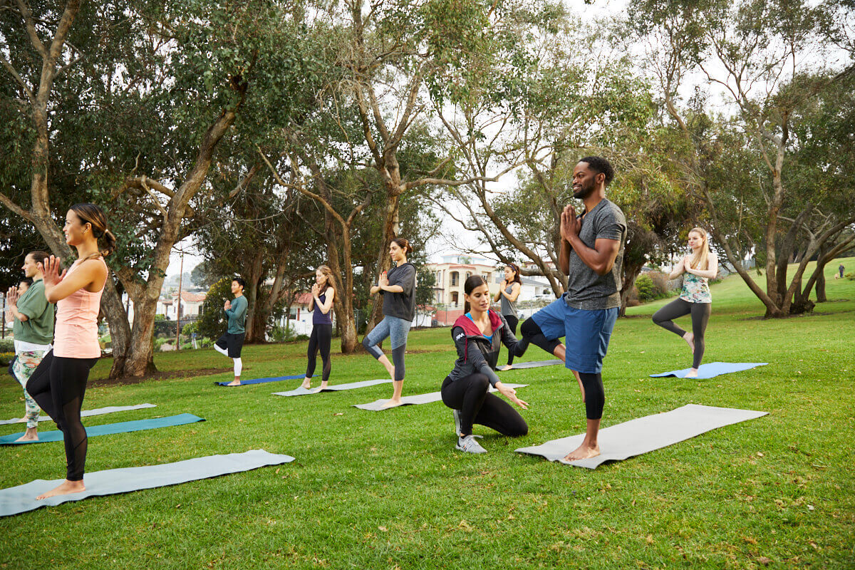 AFAA Yoga Instructor Teaching an Outdoor Class